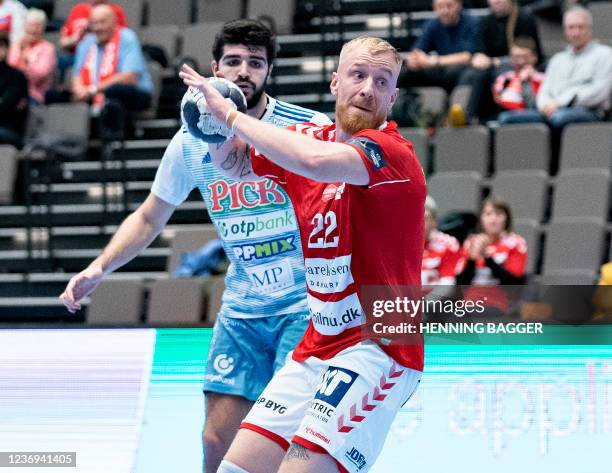 Aalborg Haandbold's Rene Antonsen try to shoot during the Champions League match between Aalborg Handball and Pick Szeged at the Sparekassen Danmark...