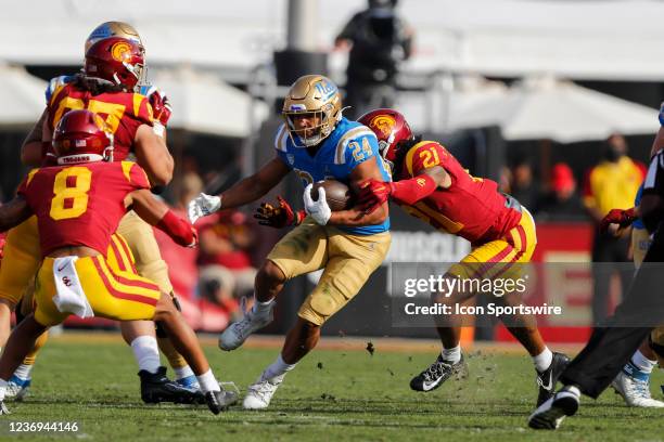 Bruins running back Zach Charbonnet runs the ball during a college football game between the UCLA Bruins and the USC Trojans on November 20 at United...