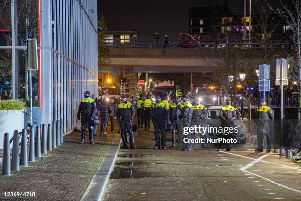 Protest against the Covid-19 measures in The Hague in front of Den Haag Centraal railway station in the city center and the canal, after the press...