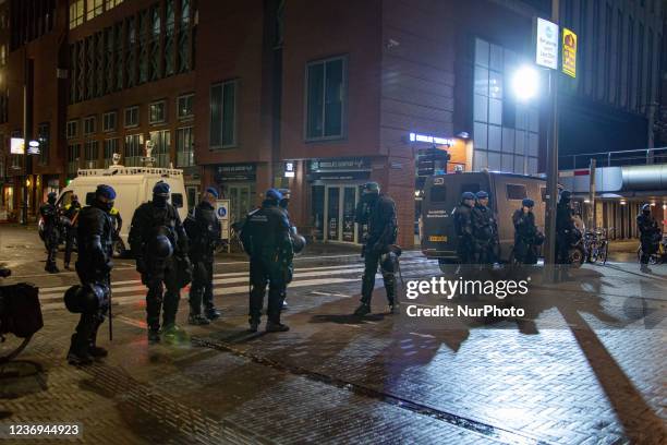 Protest against the Covid-19 measures in The Hague in front of Den Haag Centraal railway station in the city center and the canal, after the press...