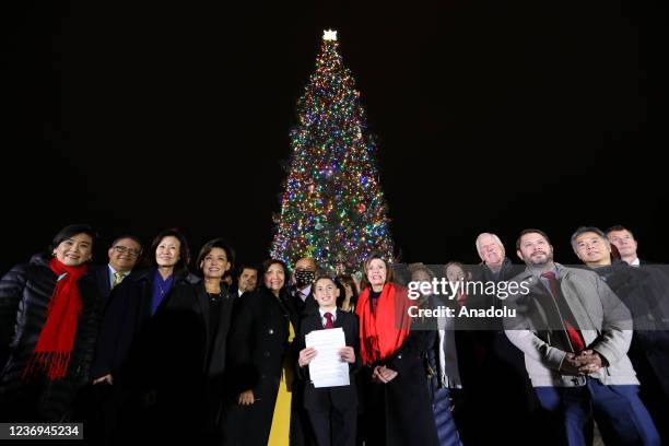 House Speaker Nancy Pelosi participates in the Capitol Christmas tree lighting ceremony on the West Front Lawn of the U.S. Capitol in Washington, DC,...