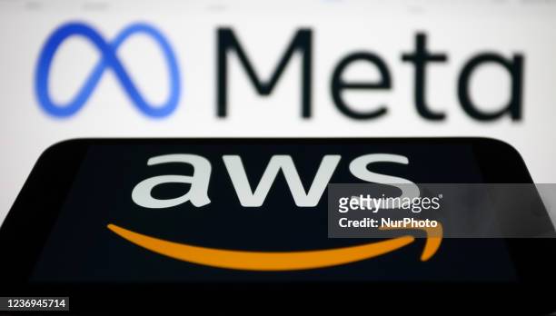 Amazon Web Services logo displayed on a phone screen and Meta logo displayed on a laptop screen are seen in this illustration photo taken in Krakow,...