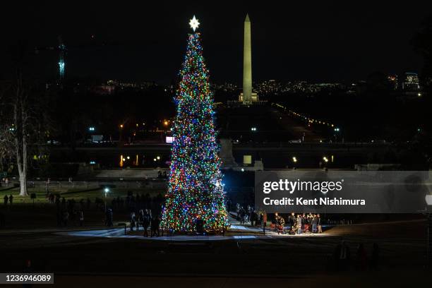 The Capitol Christmas tree is illuminated during a lighting ceremony on the West Front of the U.S. Capitol on Wednesday, Dec. 1, 2021 in Washington,...