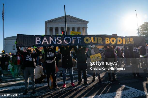 Abortion rights advocates and anti-abortion protesters demonstrate in front of the Supreme Court of the United States Supreme Court of the United...