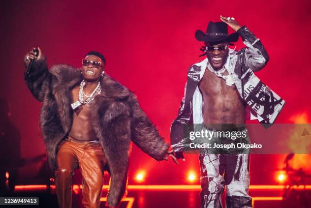 Wizkid and Burna Boy perform at The O2 Arena on December 01, 2021 in London, England.