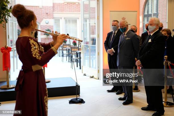 Britain's Prince Charles, Prince of Wales the President of the Royal College of Music listens to Amy Gillen during the official opening of the new...