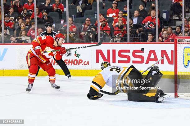 Calgary Flames Right Wing Andrew Mangiapane cant put the puck past Pittsburgh Penguins Goalie Tristan Jarry during the third period of an NHL game...