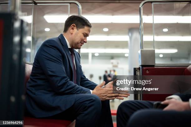 Sen. Marco Rubio takes a seat on the Senate subway after a vote at the U.S. Capitol on December 2, 2021 in Washington, DC. With a deadline at...