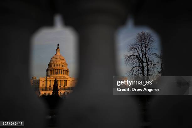 The U.S. Capitol stands at sunset on December 2, 2021 in Washington, DC. With a deadline at midnight on Friday, Congressional leaders are working to...