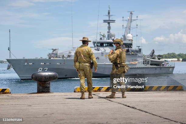 In this handout provided by the Australian Department of Defence, Commander of Joint Task Group 637.3, Lieutenant Colonel Steve Frankel , and Private...