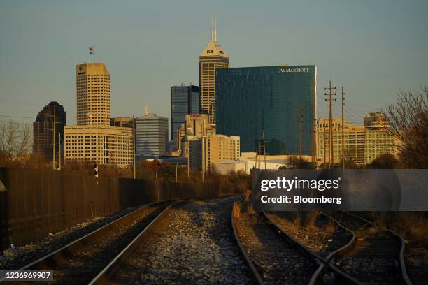 Train tracks run past hotels in downtown Indianapolis, Indiana, U.S., on Thursday, Dec. 2, 2021. Roughly $8.8 billion from the federal $1.2 trillion...