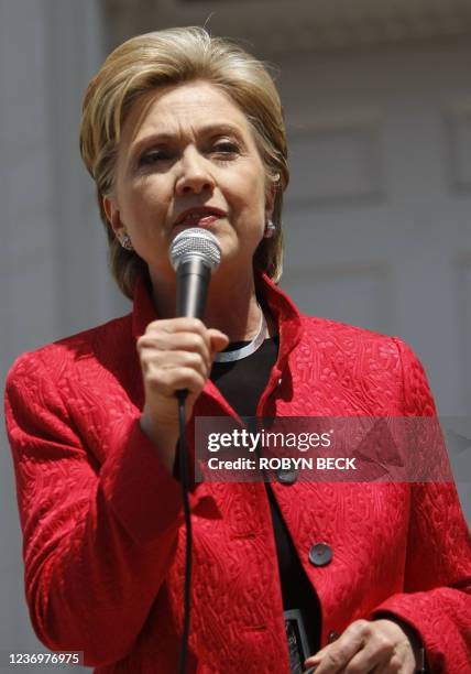 Democratic presidential hopeful New York Senator Hillary Clinton speaks to the media after a campaign event outside McMurran Hall at Shepherd...