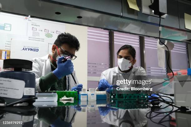 Technician uses a pipette while preparing test samples inside a Covid-19 Genome Sequencing Laboratory at the Institute of Liver and Biliary Sciences...