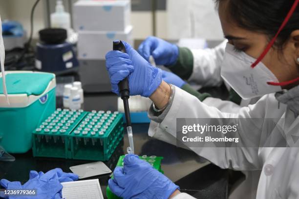 Technician uses a pipette while preparing test samples inside a Covid-19 Genome Sequencing Laboratory at the Institute of Liver and Biliary Sciences...