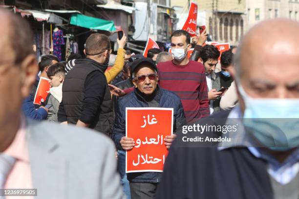 Hundreds of Jordanese gather in front of the Al-Husayni Mosque, upon the call of the parties and unions in Jordan, protesting the "water for energy"...