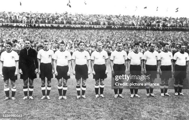 July 1954, Berlin/Sportreport: The victorious German national football team stands before kick-off of the 1954 World Cup final against Hungary at...