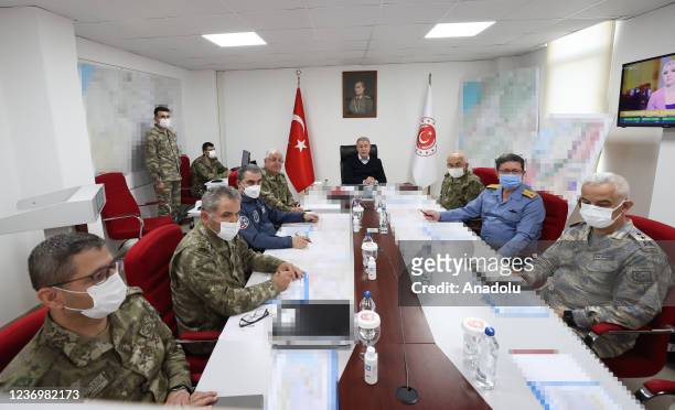 Turkish National Defence Minister Hulusi Akar, along with Chief of General Staff Gen. Yasar Guler, Land Forces Commander Gen. Musa Avsever, Naval...