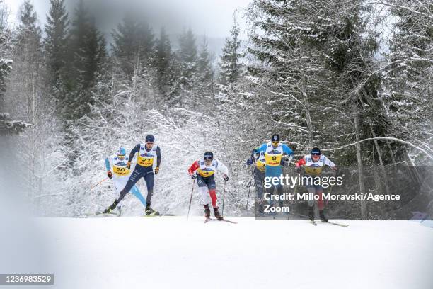 Johannes Hoesflot Klaebo of Norway takes 1st place, Larsen Thomas Helland takes 2nd place, Richard Jouve of France takes 3rd place during the FIS...