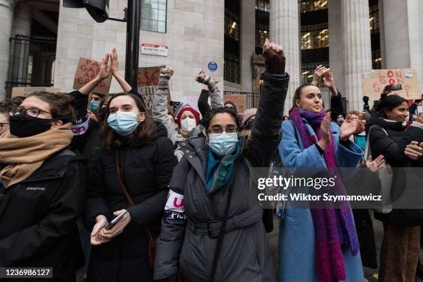 Group of students standing outside King's Colledge building shows their support as lecturers, trade unionists and students march through central...