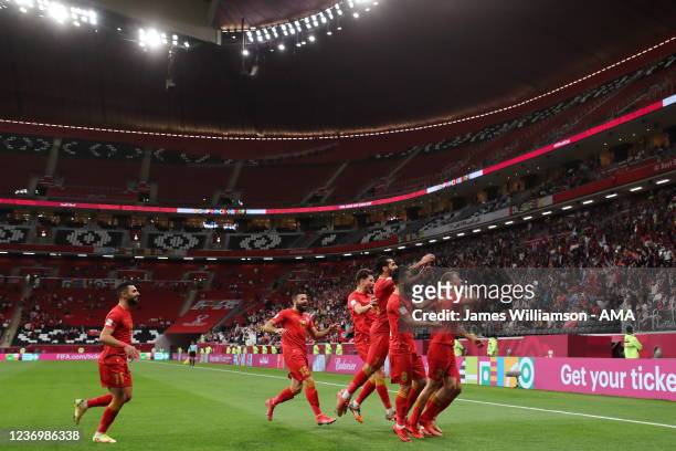 Oliver Kass Kawo of Syria celebrates after scoring a goal to make it 1-0 during the FIFA Arab Cup Qatar 2021 Group B match between Syria v Tunisia at...