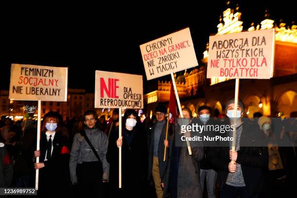 People attend 'Do not want my blood, Poland!' protest at the Main Square in Krakow, Poland on December 1st, 2021. Demonstrations were held in the...