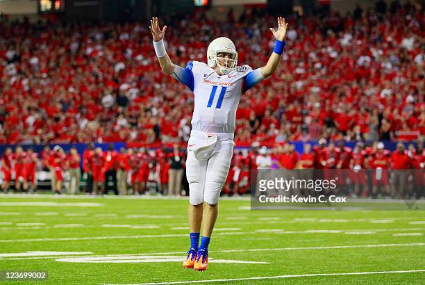 Kellen Moore of the Boise State Broncos reacts after a touchdown against the Georgia Bulldogs at Georgia Dome on September 3, 2011 in Atlanta,...