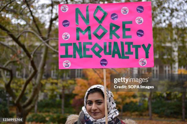 Protester seen holding a placard during the demonstration. Supporters of university workers who are on strike University and College Union UCU Strike...