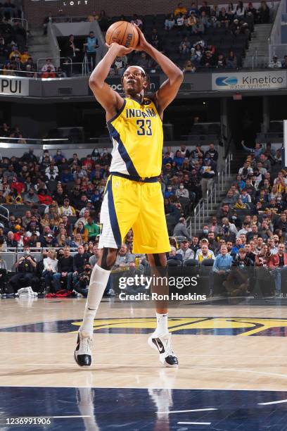 Myles Turner of the Indiana Pacers shoots the ball during the game against the Miami Heat on December 3, 2021 at Bankers Life Fieldhouse in...