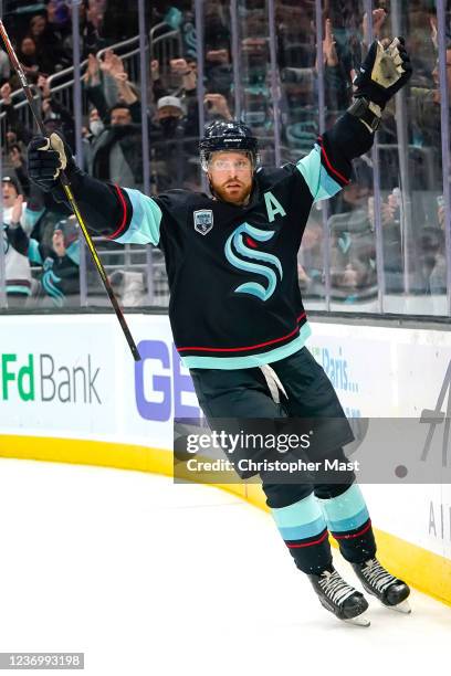 Adam Larsson of the Seattle Kraken celebrates after scoring a goal during the first period to take a 2-1 lead against the Edmonton Oilers at Climate...