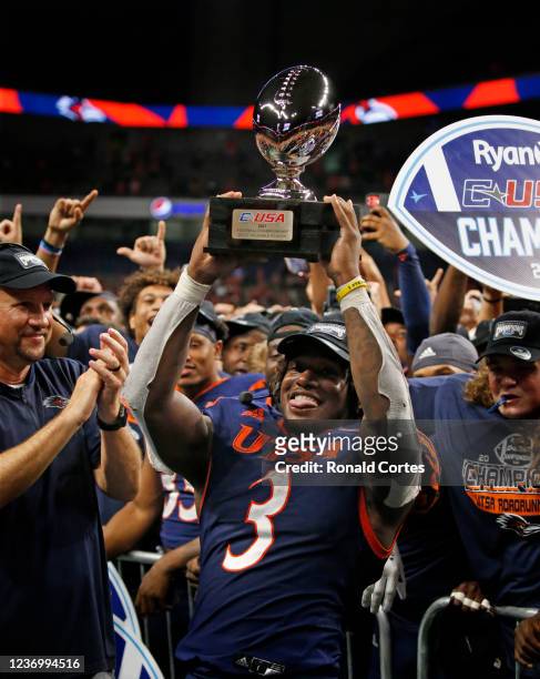 Running back Sincere McCormick of the UTSA Roadrunners holds up his MVP trophy at the Alamodome on December 3, 2021 in San Antonio, Texas.
