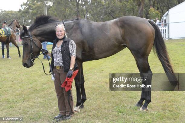 Annie Goble with Femme Americain after winning the HomeRun Food Co Trophy Race Handicap at Balnarring Racecourse on December 04, 2021 in Balnarring,...