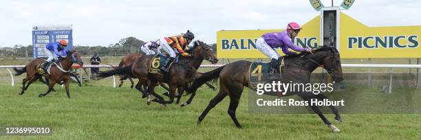 Femme Americain ridden by Shaun Cooper wins the HomeRun Food Co Trophy Race Handicap at Balnarring Racecourse on December 04, 2021 in Balnarring,...