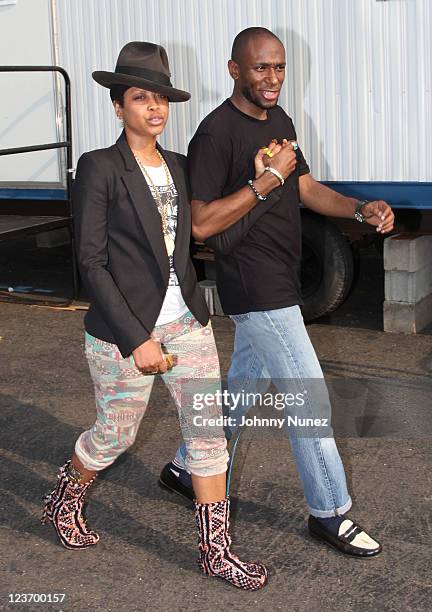 Erykah Badu and Mos Def attend the 8th Annual Rock The Bells festival on Governor's Island on September 3, 2011 in New York City.