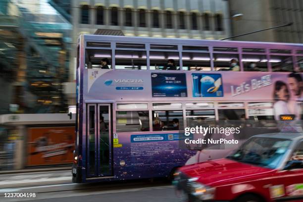 Hong Kong, 4 Dec 2021, A Hong Kong tramway features a publicity for Viagra.