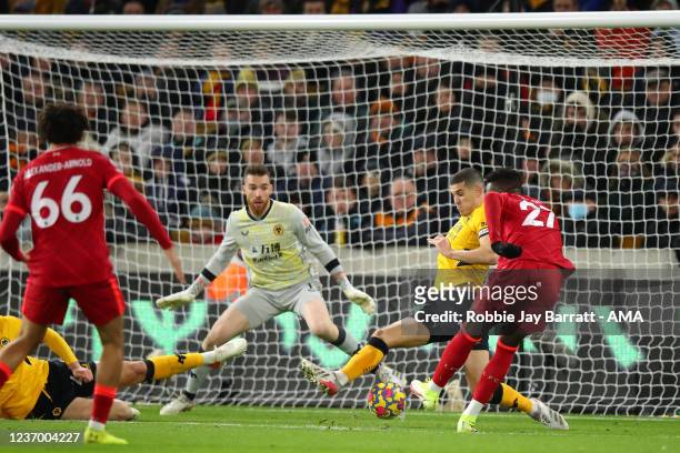 Divock Origi of Liverpool /.s/ 0-1 during the Premier League match between Wolverhampton Wanderers and Liverpool at Molineux on December 4, 2021 in...