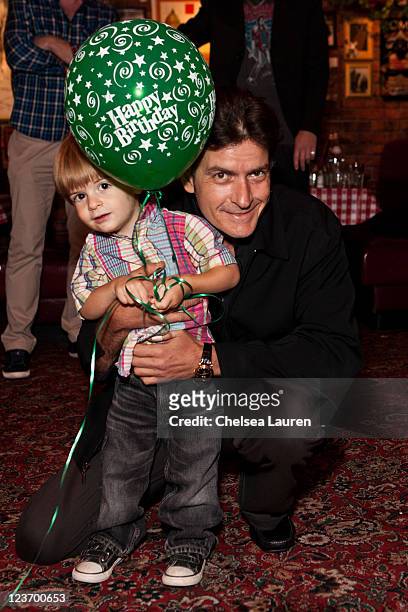 Actor Charlie Sheen poses with son Bob Sheen at his birthday celebration with family at Buca di Beppo on September 3, 2011 in Encino, California.