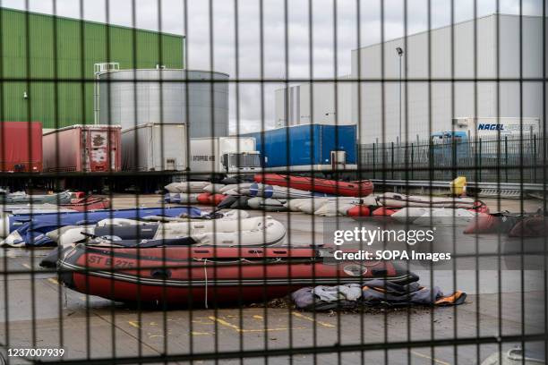 Migrant inflatable boats are seen at the industrial estate near the town of Dover. Large numbers of migrants are crossing the English Channel with...