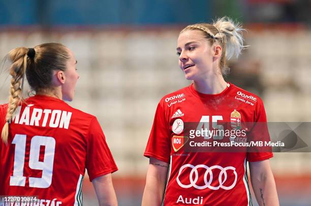 Greta Marton and Noemi Hafra of Hungary react during 25th IHF Women's World Championship match between Hungary and Czech Republic on December 4, 2021...