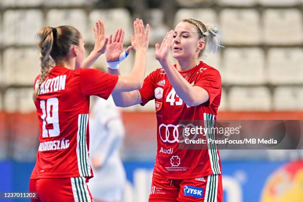 Greta Marton and Noemi Hafra of Hungary react during 25th IHF Women's World Championship match between Hungary and Czech Republic on December 4, 2021...