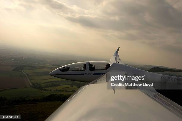 High performance glider mid air over the Yorkshire Gliding Club which lies on a plateau in the North Yorkshire Moors National Park on September 1,...