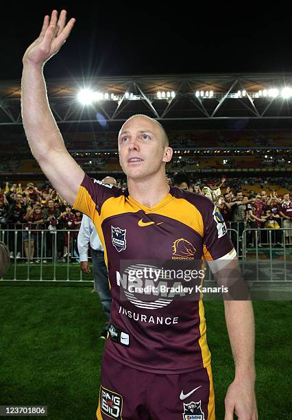 Darren Lockyer of the Broncos farewells fans in his last regular season home game during the round 26 NRL match between the the Brisbane Broncos and...