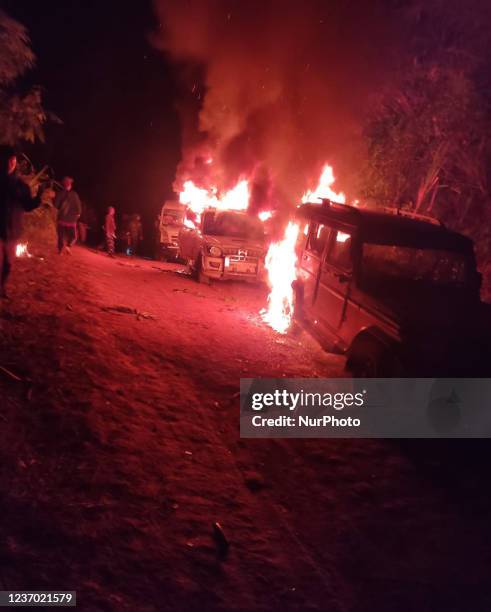 Angry villagers torched vehicles belonging to Indian security forces from Assam Rifles after 13 civilian were killed by Indian security personnel in...