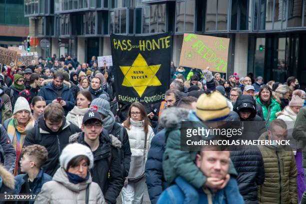Illustration picture shows a protest against the health pass and other corona measures, in Brussels, Sunday 05 December 2021. Various organizations...