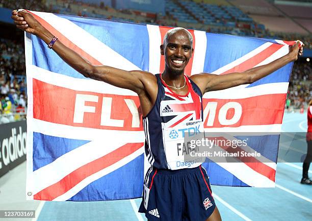 Mohamed Farah of Great Britain celebrates after claiming victory in the men's 5000 metres final during day nine of 13th IAAF World Athletics...