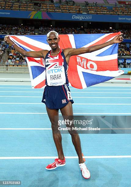 Mohamed Farah of Great Britain celebrates after claiming victory in the men's 5000 metres final during day nine of 13th IAAF World Athletics...