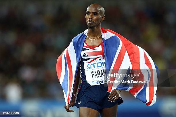 Mohamed Farah of Great Britain celebrates after claiming victory in the men's 5000 metres final during day nine of 13th IAAF World Athletics...