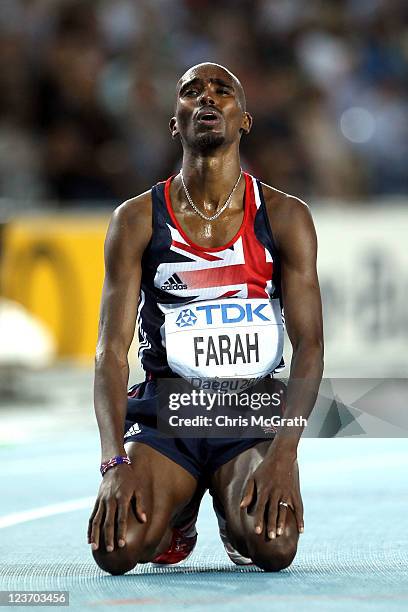 Mohamed Farah of Great Britain reacts after claiming victory in the men's 5000 metres final during day nine of 13th IAAF World Athletics...