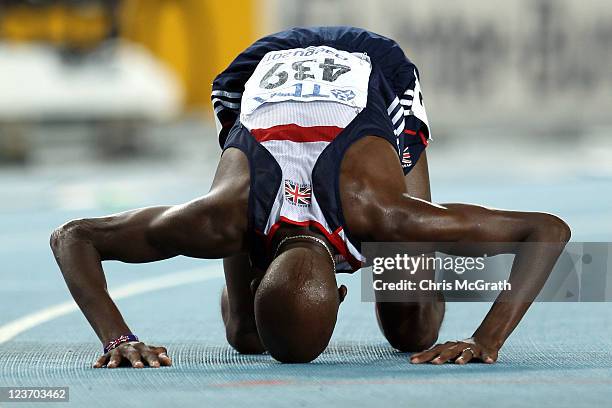 Mohamed Farah of Great Britain reacts after claiming victory in the men's 5000 metres final during day nine of 13th IAAF World Athletics...