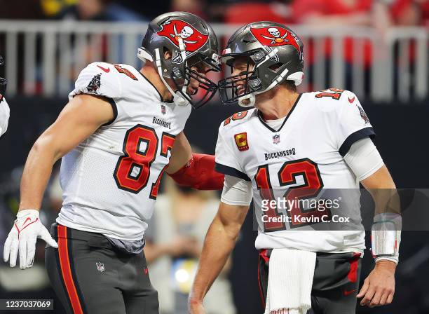 Rob Gronkowski of the Tampa Bay Buccaneers celebrates his touchdown against the Atlanta Falcons with teammate Tom Brady during the second quarter at...