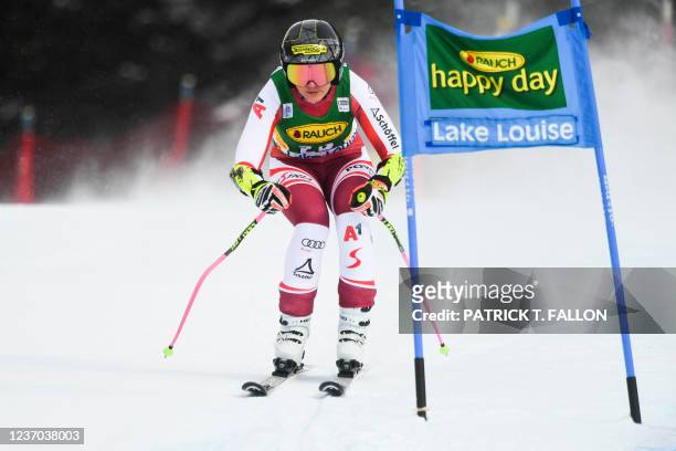 Stephanie Venier of Austria races during Audi FIS Ski World Cup Women's 2021 Super-G skiing championship race at Lake Louise Ski Resort in Banff...